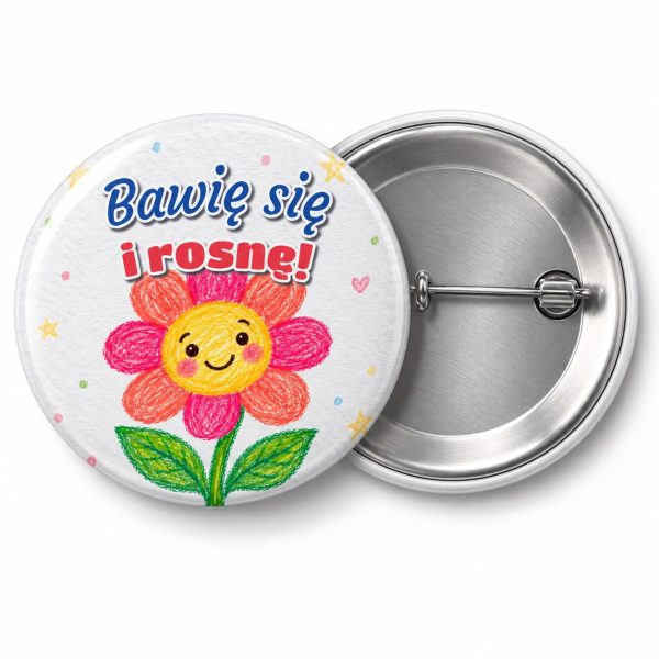 Przypinka Bawię Się i Rosnę Kredkowy Kwiatek: przypinka na pasowanie na przedszkolaka z napisem Bawię się i rosnę! – przód i aluminiowy tył z agrafką