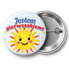 Przypinka Jestem Pierwszakiem Kredkowe Słońce: przypinka na pasowanie pierwszoklasisty z napisem Jestem pierwszakiem! – przód i aluminiowy tył z agrafką