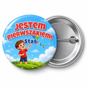 Przypinka Jestem Pierwszakiem z Imieniem Latawiec: przypinka na pasowanie pierwszoklasisty z napisem Jestem Pierwszakiem! oraz polem imię (np. Staś) – przód i aluminiowy tył z agrafką