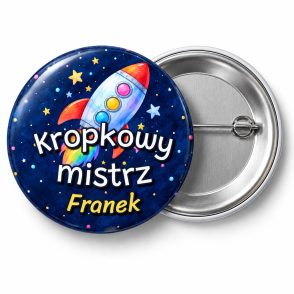 Przypinka Kropkowy Mistrz Rakieta: przypinka na Dzień Kropki z napisem Kropkowy mistrz oraz polem imię (np. Franek) – przód i aluminiowy tył z agrafką