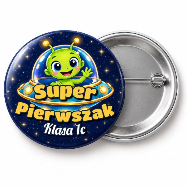 Przypinka Super Pierwszak z Nazwą Klasy Ufoludek: przypinka na pasowanie pierwszoklasisty z napisem Super Pierwszak oraz polem klasa (np. Klasa 1c) – przód i aluminiowy tył z agrafką