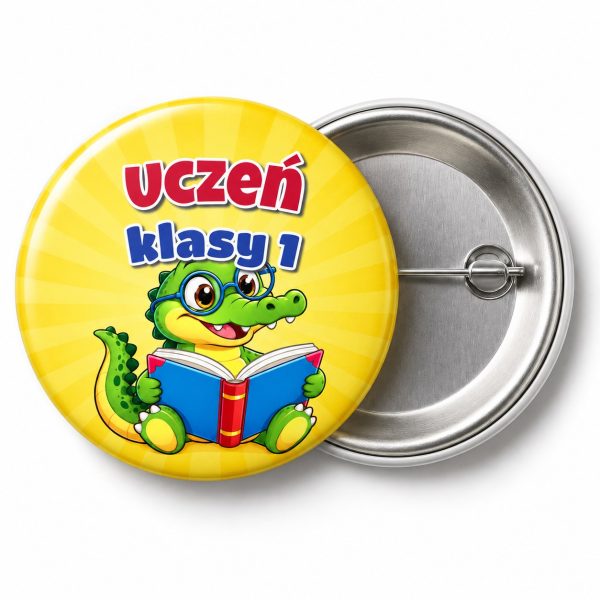 Przypinka Uczeń Klasy 1 Krokodylek: przypinka na pasowanie pierwszoklasisty z napisem Uczeń klasy 1 – przód i aluminiowy tył z agrafką